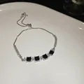 Eleganz verstellbares versilbertes Armband mit schwarzen Zirkonia und klaren Steinen - Schwarzer Quadratischer Zirkonia-Stil (86#) / Silber