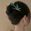 Detailed view of an elegant Chinese style bamboo leaf hairpin in dark hair - Green Bamboo Leaf Style / Brown