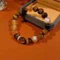 Yellow phantom crystal and tiger eye stone beaded bracelet in Maillard style - Style 56 (Hollow Flower) / Brown