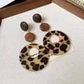 Detail view of vintage Maillard leopard print earrings with wooden beads and silver needles. - Geometric Round Style (HE29208) / Silver Post Coffee
