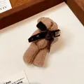 Close-up detail of a brown flocked bear brooch featuring a dark velvet bow accent - Bow Bear (9#)