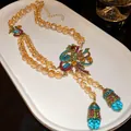 Collar vintage de estilo palacio con cuentas de color champán y colgante de pavo real - Collar (80#) / Dorado/Multicolor