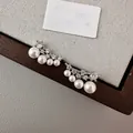 Elegant 18k gold plated zircon and pearl stud earrings with a curved design - Curved Arrangement / Silver-White