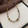 Elegante Retro-Halskette aus braunem Tigerauge mit goldfarbenen Abstandsperlen Akzenten - 45# Halskette-Gold-Braun Tigerauge Patchwork
