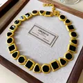 Elegant vintage gold-textured necklace featuring black geometric inlays in a palace style - Style 3 Necklace