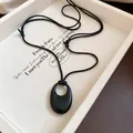Elegant black oval ceramic pendant necklace with minimalist cord for retro fashion style - Black Ceramic Oval Style (20#) / Adjustable / Black