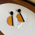 Detailed close-up view of retro geometric round earrings featuring artistic wood grain texture - Style 7(7#)