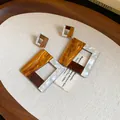 Detailed view of vintage geometric resin earrings featuring amber and pearl textures - Style 2(2#)