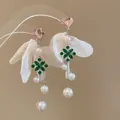 Detail view of elegant earrings with pink hearts, chiffon petals, green crystals and pearls. - Chiffon Flower Tassel Style (33# Silver Earring Post) / Pink, Green