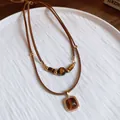 Double-layered retro tiger eye stone pendant necklace with brown suede cord for women - Necklace (37#) / Gold Brown