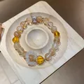 Nahaufnahme eines Kristallperlenarmbands im neuen chinesischen Stil mit Zirkonblüte - Blumenform Stil (74) / Exquisites Geschenkbox-Set / Gelb