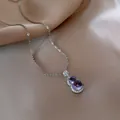 Elegant titanium steel necklace with purple zircon gourd pendant on a silk background. - Style 8