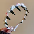 Close-up detail of colorful yarn-wrapped wavy headband with soft wool texture and black teeth - 4# Headband-White