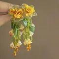 Detailed macro view of handcrafted beaded yellow rose flower long tassel earrings. - Orange Leaf Lily of the Valley Silver Earring Post (23#)