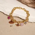 Elegant ocean themed gold charm bracelet featuring star shell and planet pendants - Planet Charm Bracelet (HB2985) / Gold Brown