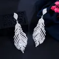 Elegant silver-colored feather drop earrings encrusted with sparkling clear zircon stones - Feather Style (HE14521) / Silver