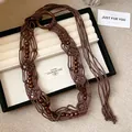 Boheemse bruine gevlochten touw tailleketting met natuurlijke ronde houten kralen - Houten Ring Kwastje Stijl / Bruin