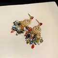 Detailed macro view of colorful crystal tassel earrings with sparkling rhinestones set. - Silver Earring Post - Colorful