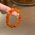 Elegantes orangefarbenes Perlenarmband mit feinem Zirkon-Blumenanhänger. - 86# Armband - Exquisite Geschenkbox / 10mm / Braun