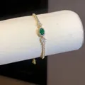 Elegante bracciale in oro stile francese con pietra ovale verde e zirconi per donna - Oro-Verde