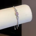 Bracciale elegante con zircone rosa ovale e finitura argento, catena regolabile - Argento-Rosa