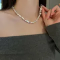 Minimalist silver geometric beaded necklace worn by a female model on a grey top - Geometric Irregular Style (8#) / Silver