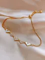 Elegante bracciale a cuore placcato oro con zirconi su morbido tessuto di raso - Bracciale Scorrevole Cuore in Madreperla (13#) / Oro