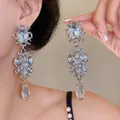 Detail shot of oversized baroque silver earrings with clear teardrop crystals - 29# Silver Earring Post - Silver
