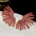 Close-up view of radiant fan-shaped earrings encrusted with pink zircons on gold base - 48# Steel Needle - Gold Pink