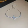 Elegant adjustable silver-tone bracelet with sparkling zircon clover motif for women - 60# Bracelet - Silver