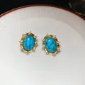 Close-up detail of elegant vintage-style gold turquoise stud earrings with a crystal halo - 42# Retro Turquoise Texture Style / Gold-Blue