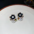 Detailed view of elegant black flower stud earrings with pearl drop and crystals - 44# Black & White Camellia Pearl Style / Gold-Black