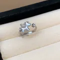 Macro view of a silver unicorn ring with shimmering zircon wings in a jewelry box - Unicorn Star Style (HR2941) / Silver
