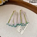 Handmade bead tassel earrings with pink and green accents and silver needles. - 48# Colorful Fan Shape Beaded Tassel Style / Pink