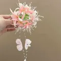 Elegant pink 3D artificial flower hair clip featuring long beaded butterfly tassels - Hair Claw - Pink