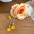 Elegant champagne rose fabric hair clip featuring pearl tassels and yellow flower bud accents - Duckbill Clip (30#) / Orange-White