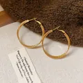 Elegant gold hoop earrings with a multi-layered intertwined design for stylish women - Triple Woven Ring Style (136#) / Gold