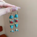 Unique fish-shaped dangling earrings with turquoise enamel and red focal stones - Color-Blocking Fishbone Tassel Style (128# Silver Earring Post) / Gold + Blue