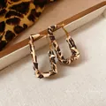 Trendy leopard print rectangular hoop earrings with gold-tone findings on neutral background - Rectangular Leopard Print Style (50#) / Coffee Leopard