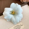 Elegant light blue fabric flower hair clip featuring realistic petal texture and yellow stamen - Duckbill Clip (60#) / Blue-Yellow