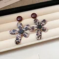 Stylish flower-shaped earrings with leopard print petals displayed in a jewelry tray - 76# Leopard Petal 925 Sterling Silver Earring Post Style / Dark Gold Leopard Print