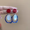 Elegant silver needle earrings with red studs, blue wavy rings, and oval pearl stones - Irregular Geometric Cat Eye Stone Style (92#) / Red-Blue