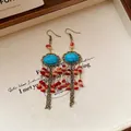 Vintage bohemian style tassel earrings with oval turquoise and red beads detail - Bohemian Turquoise Metal Tassel Style (99#) / Gold-Blue-Red