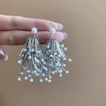 Elegant silver needle tassel earrings featuring cascading white beads and floral design - Silver Earring Post-Tassel Flower Style (147#) / Silver-White