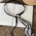 Close-up of vintage black and white paisley scarf belt with thin leather strap for women - 8# Waist Chain - Black