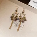 Bohemian gold triangle earrings with green beads and long chain tassels. - 117# Triangle Tassel Style (HE11080) / Hook Style / Gold Brown