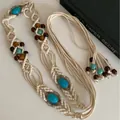 Detailed view of a boho macrame belt featuring turquoise stones and wooden beads - 32# Waist Chain - White Blue