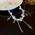 Elegant double-layer baroque pearl necklace with silver star pendants and tassels. - Pearl Star