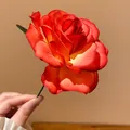 Close-up detail shot of a vibrant orange-red fabric rose hairpin for seaside vacation hair styling. - Hair Stick Red-Rose / Red