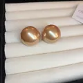 Elegant golden spherical pearl stud earrings in a white jewelry display tray - 45# Silver Needle - Champagne